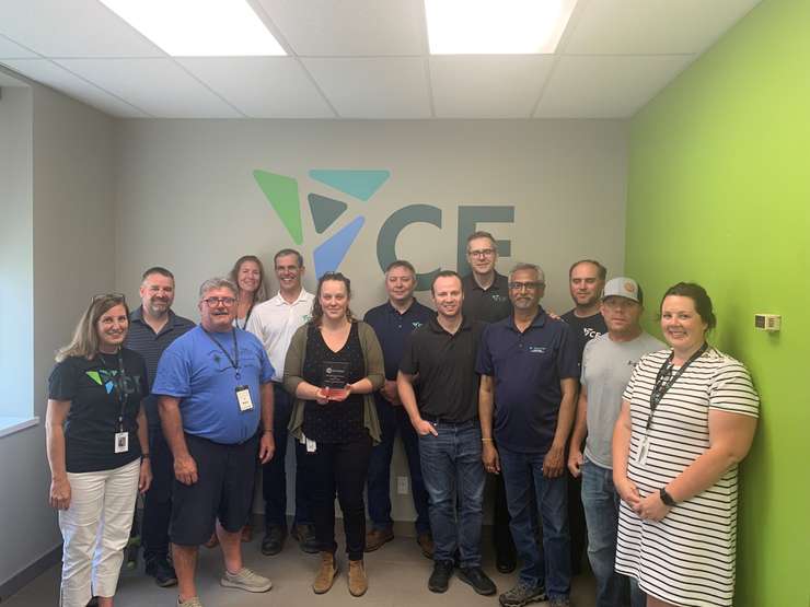 Inn of the Good Shepherd Executive Director Myles Vanni (third from left) delivers CF Industries CANstruction team members their international award. June 24, 2025.