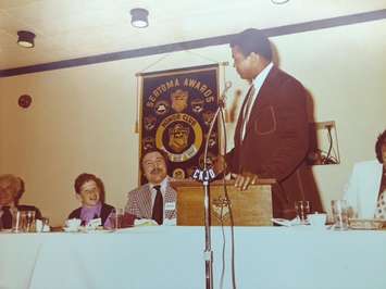 Muhammad Ali speaks to a crowd at the Sarnia Sertoma Sports Celebrity Dinner in 1974. (Photo submitted by  former Blackburn Sports Director George Heath)  