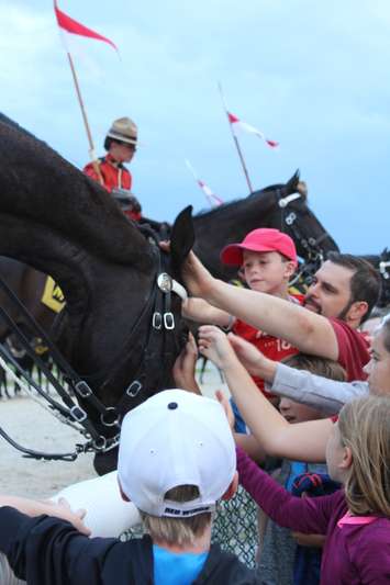 During the meet and greet at the 2016 RCMP Musical Ride at the Dresden raceway. August 24, 2016. (Photo by Natalia Vega)