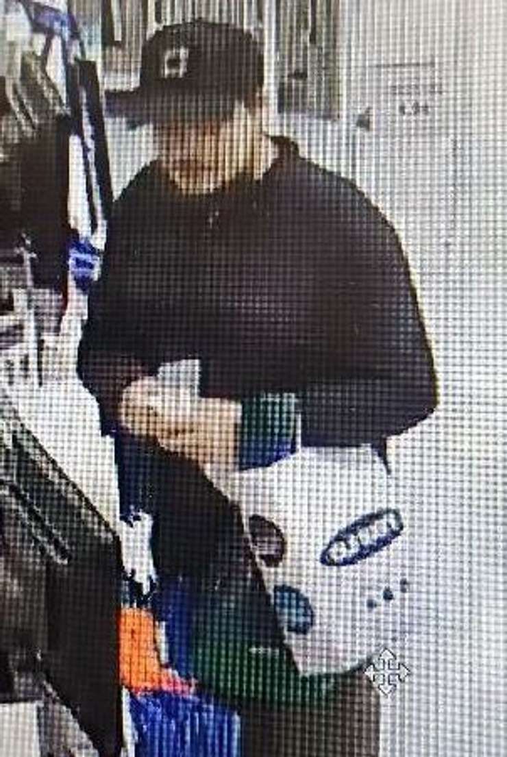 Surveillance image of counterfeit bill investigation. October 3, 2023. (Photo courtesy of Sarnia Police Service) 