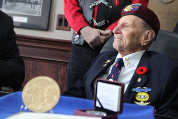 Local World War II veteran Ralph Mayville speaks with reporters on February 6, 2015 about receiving the Congressional Gold Medal. (Photo by Jason Viau)