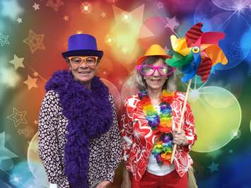 Corunna residents Marjorie Cain (left) and Catherine Van Bastelaar dress up at Sarnia's Age Friendly Expo.
