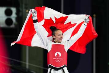 Team Canada’s Skylar Park celebrates winning a bronze medal in women's -57kg taekwondo at the 2024 Paris Olympic Games in France on Thursday, August 8, 2024. (Photo by Candice Ward/COC)