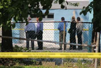 Police investigate an apparent homicide in the 500 block of Brant St., June 4, 2015. (Photo by Jason Viau)