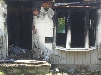 A Reaume Ave. fire has gutted one home in Wallaceburg and caused heat damage to a neighbouring home.
(Photo by Blackburn Radio Summer Patrol)
