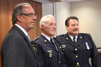Chatham-Kent Mayor Randy Hope (left), Police Chief Gary Conn (middle) and Deputy Chief Designate Jeff Littlewood (right) at police headquarters, July 23, 2015. (Photo by Mike Vlasveld)