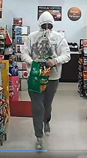 This man is wanted in connection with a robbery at a convenience store in Chatham. (Photo courtesy of Chatham-Kent police)