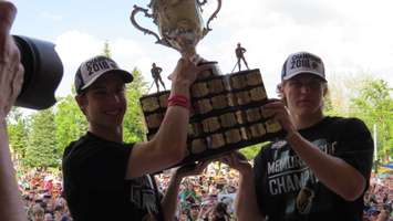 London Knights co-captains Mitchell Marner and Christian Dvorak raise the Memorial Cup at Victoria Park, May 30, 2016. Photo by Miranda Chant, Blackburn News.