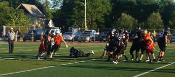 Imperials pressure the Oakville QB. August 6, 2016. Photo by Jake Jeffrey (www.blackburnnews.com)