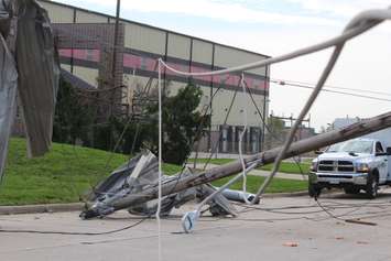 Crews assess and clean up the damage left near the EC Row Expressway and Central Avenue in Windsor on August 25, 2016 after a tornado hit the area. (Photo by Ricardo Veneza)