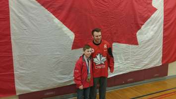 Tyler McGregor poses with Brady O'Halloran during a ceremony at North Lambton Secondary School. April 3, 2018. (Photo by Colin Gowdy, Blackburn News)