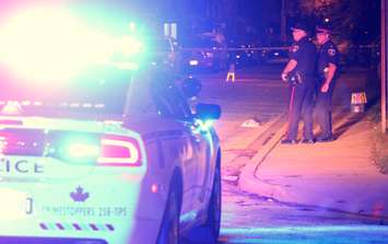 Windsor police investigate an incident at the intersection of Brant St. and Louis Ave., September 29, 2015. (Photo by Jason Viau)