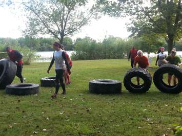 Participants tackle the Grapes of Wrath obstacle course at CM Wilson Conservation Area in Blenheim, September 12, 2015. (Photo by Cheryl Johnstone)