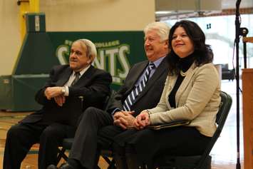 It's announced that Patti France (right) takes over for John Strasser (far left) as President of St. Clair College, February 26, 2015. (Photo by Mike Vlasveld)