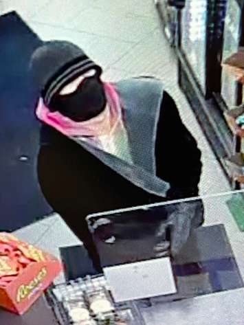 Chatham-Kent police have released a photo of a suspect who is wanted in connection with a robbery at the Circle K in Tilbury. (Photo courtesy of Chatham-Kent police)
