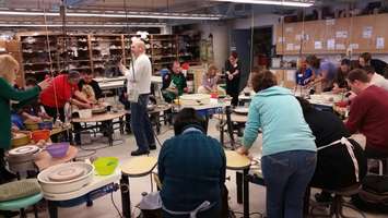Local politicians, police and other community members work on pottery at Lambton College. January 12, 2015 (BlackburnNews.com photo by Jake Jeffrey)