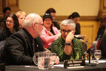 Leamington Mayor John Paterson and Leamington Deputy Mayor Hilda McDonald speak with each other at the inaugural County Council meeting at the Ciociaro Club on December 10, 2014. (Photo by Ricardo Veneza)