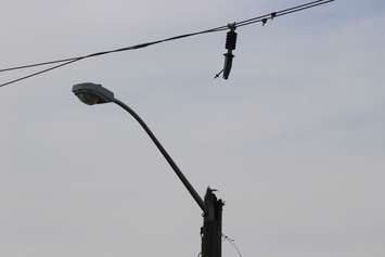 A pole fire causes a transformer to fall on Tecumseh Rd. at Southfield Dr. in Tecumseh, June 18, 2015. (Photo by Jason Viau)