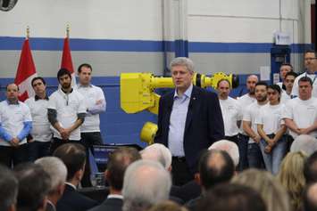 Canadian Prime Minister Stephen Harper makes an announcement at Valiant Machine & Tool in Windsor, May 14, 2015. (Photo by Mike Vlasveld)