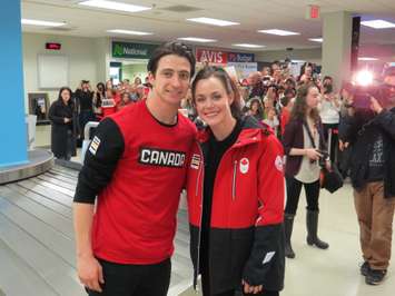 Scott Moir and Tessa Virtue arrive at the London International Airport, February 26, 2018. Photo by Scott Kitching. 