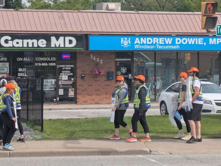 WSIB employees represented by CUPE picket outside Windsor-Tecumseh MPP Andrew Dowie's constituency office in Windsor, May 27, 2025. Photo by Mark Brown/WindsorNewsToday.ca.