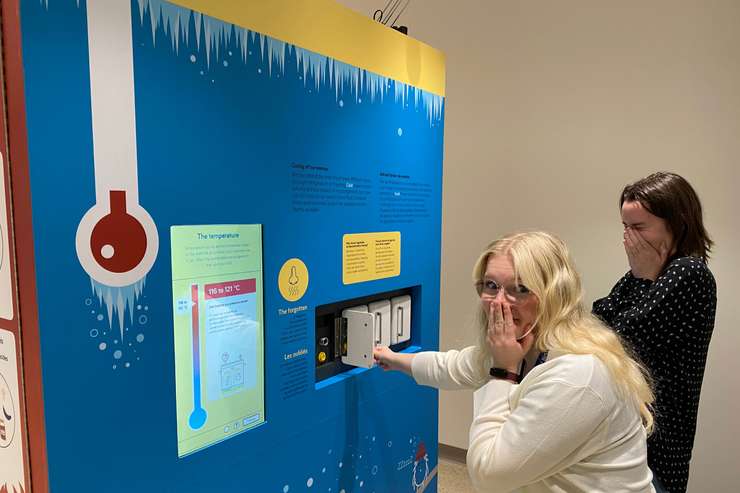 Staff trying an interactive display at the Lambton Heritage Museum (Photo by: County of Lambton)