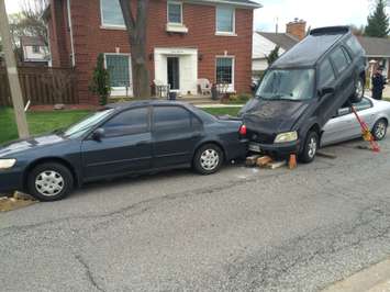 Windsor police investigate a crash in the 1900 block of Ypres Ave., April 23, 2015. (Photo by Jason Viau)