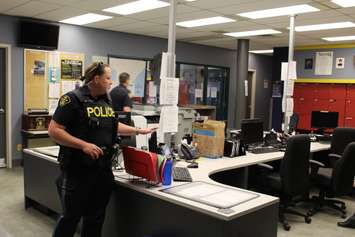Members of the public are taken on a tour of the Chatham-Kent OPP detachment on May 19, 2016. (Photo by Ricardo Veneza)