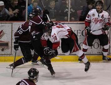 The Leamington Flyers battle the Chatham Maroons in game five of the GOJHL Western Conference Finals. April 3, 2014. (photo by Mike Vlasveld)