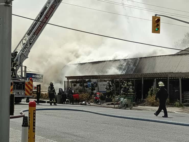 Firefighters on the scene of a hardware store fire in Grand Bend, May 22, 2026. Photo courtesy Arthur Travis.