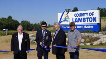 (From right to left) St. Clair Twp. Deputy Mayor Steve Miller, Lambton Warden Kevin Marriott, St. Clair Twp. Mayor Steve Arnold and Brooke-Alvinston Mayor Dave Ferguson during the ribbon cutting ceremony for the County of Lambton gateway sign.  7 July 2022.  (Photo by Blackburn Media)