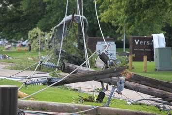 Crews assess and clean up the damage left near the EC Row Expressway and Central Avenue in Windsor on August 25, 2016 after a tornado hit the area. (Photo by Ricardo Veneza)