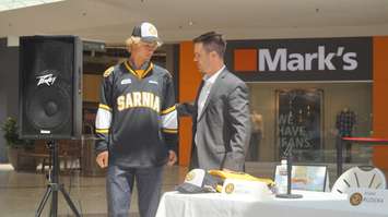 Kelton Hatcher with Sarnia Sting GM Nick Sinclair. (photo by Jake Jeffrey blackburnnews.com)