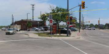 Windsor police investigating a shooting on Wyandotte St. E near Walker Rd., June 22, 2016. (Photo by Maureen Revait)