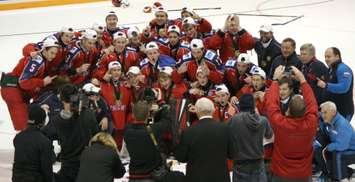 Russia poses with its gold medals after edging the U-S 2-1 Nov. 8, 2014 at the RBC Centre. (BlackburnNews.com photo by Dave Dentinger)