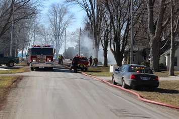Essex firefighters battle a residential blaze in the 100-block of Park St. in Harrow, March 18, 2015. (Photo by Mike Vlasveld)