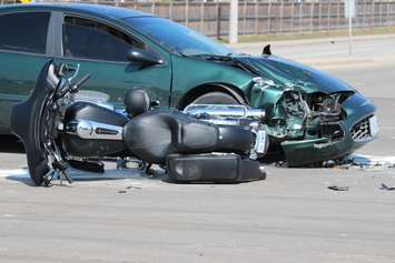 One person has been sent to hospital following a crash at the intersection of Lauzon Rd. and McHugh St., April 1, 2015. (Photo by Jason Viau)