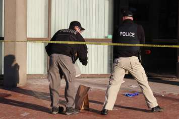 Windsor police investigate a stabbing at 810 Ouellette Ave., April 24, 2015. (Photo by Jason Viau)