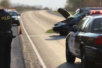 OPP officers investigate a fatal crash on Hwy. 3 near Morse Rd., April 29, 2015. (Photo by Jason Viau)