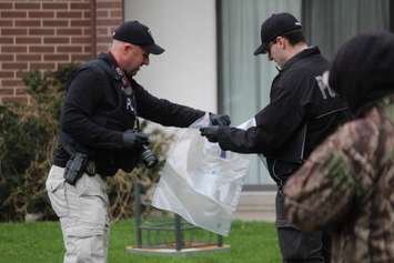 Windsor police investigate a stabbing in the 400 block of Glengarry Ave., April 22, 2015. (Photo by Jason Viau)