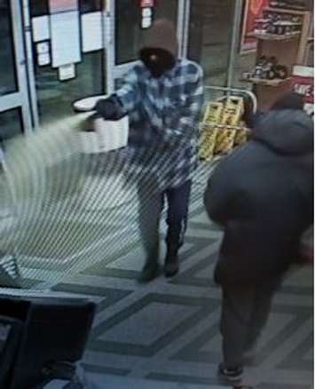 One of the suspects in an armed robbery at a business on Wyandotte St. E. in Windsor on December 8, 2018. Photo provided by Windsor Police Service.