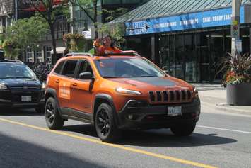 Windsor West MPP Lisa Gretzky waves during the Windsor PrideFest Parade, August 13, 2017. Photo by Mark Brown/Blackburn News.