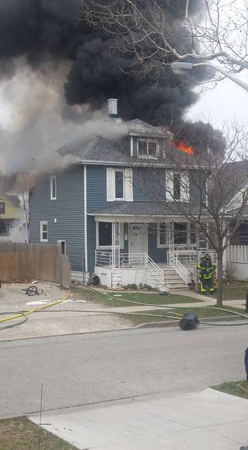 Windsor firefighters battle blaze on Hickory St. in Windsor, March 23, 2016. (Submitted photo)