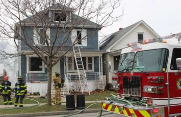 Windsor fire battling a blaze on Hickory St. in Ford City, March 23, 2016 (Photo by Maureen Revait)