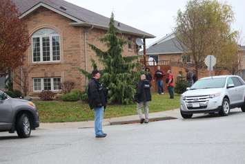 Windsor police ESU surround house in east Windsor to serve an outstanding arrest warrant, December 1, 2015. (Photo by Maureen Revait) 
