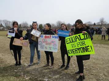 A. B. Lucas secondary school students hold protest signs during student walk outs, April 4, 2019. (Photo by Miranda Chant, Blackburn News)