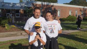 Faith Abbey with her family before beginning her walk to London to raise awareness for childhood cancer. Sept 15, 2015. photo by Jake Jeffrey (blackburnnews.com)