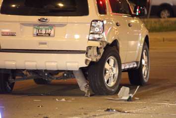 One vehicle flipped following a collision at the intersection of Howard Ave. and Tecumseh Rd. E, May 19, 2015. (Photo by Jason Viau)