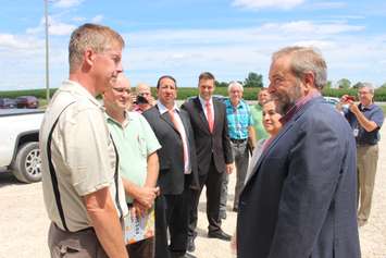 NDP Leader Tom Mulcair visits a pepper farm in Chatham-Kent, July 22, 2015. (Photo by Mike Vlasveld)
