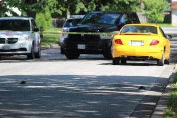 Windsor police on scene of a pedestrian being hit in west Windsor on July 30, 2015. (Photo by Jason Viau)